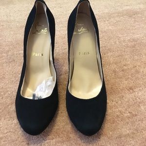 Black suede pumps